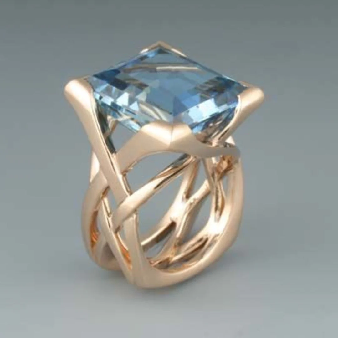 Classic Gold Ring with Blue Topaz Stone - Vossary