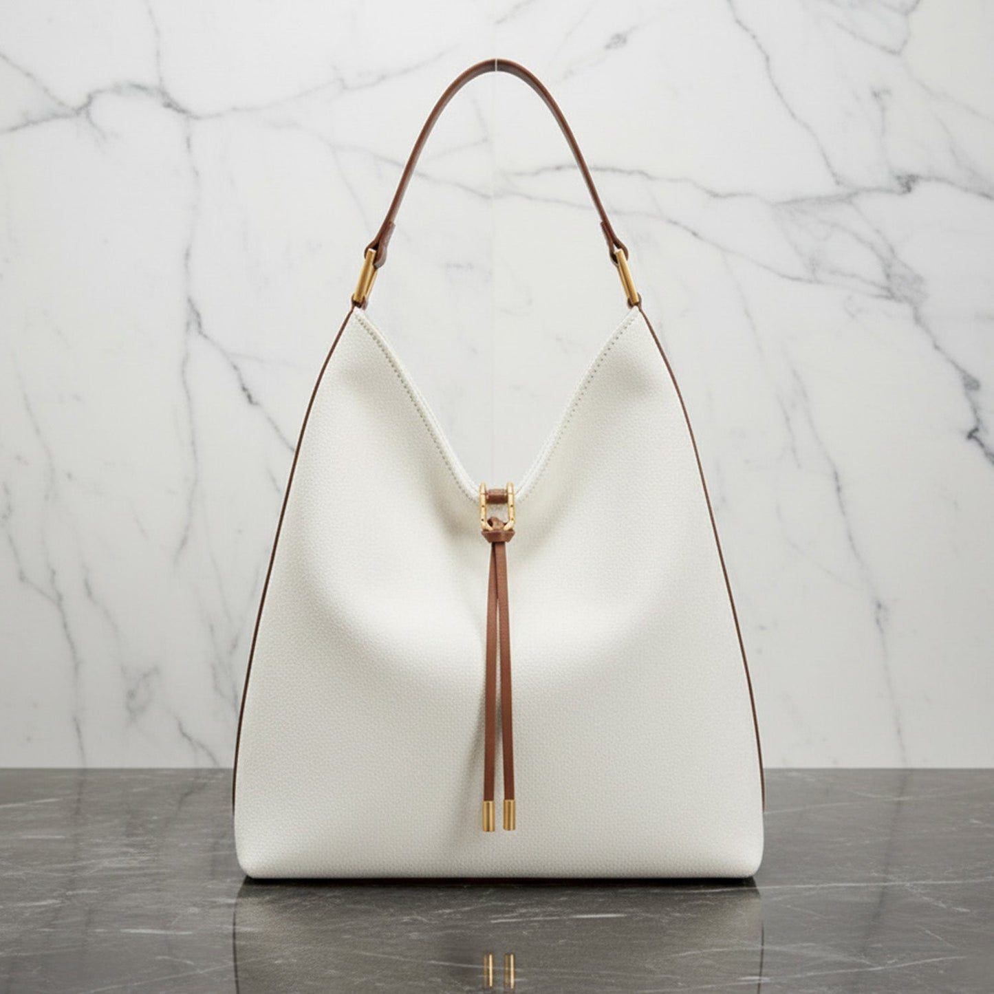 Chic Slouch Bag with Gold Accent and Drawstring Closure