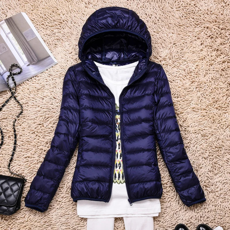 Compact Women's Insulated Travel Coat - Waterproof Hooded Jacket