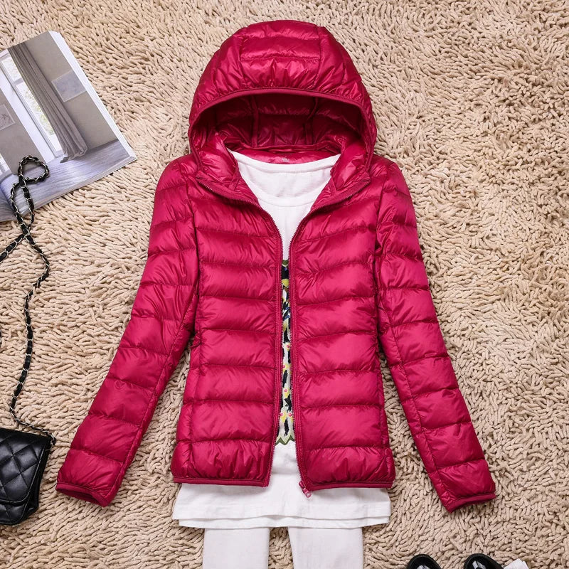 Compact Women's Insulated Travel Coat - Waterproof Hooded Jacket