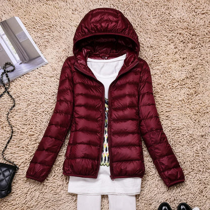 Compact Women's Insulated Travel Coat - Waterproof Hooded Jacket