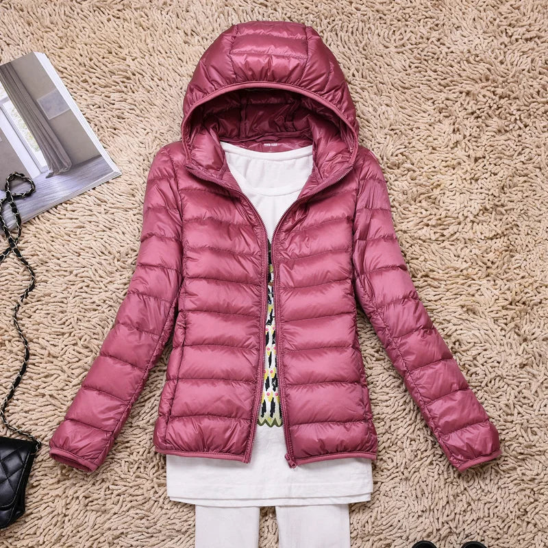 Compact Women's Insulated Travel Coat - Waterproof Hooded Jacket