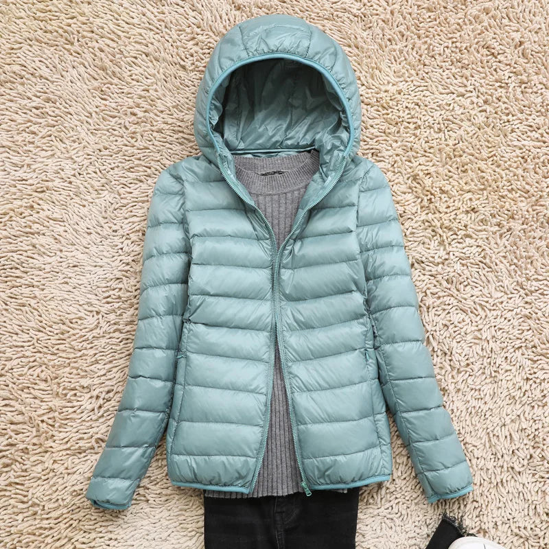 Compact Women's Insulated Travel Coat - Waterproof Hooded Jacket