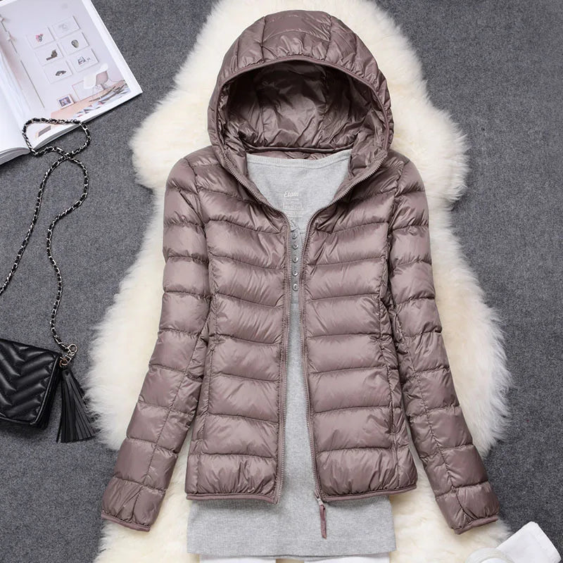 Compact Women's Insulated Travel Coat - Waterproof Hooded Jacket - Luxicro