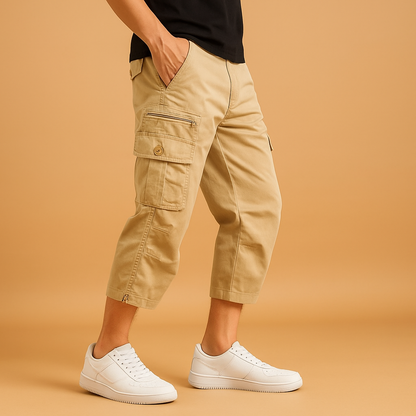 Men’s long cargo shorts with breathable cotton fabric and multiple pockets, ideal for summer, travel, and outdoor activities.
