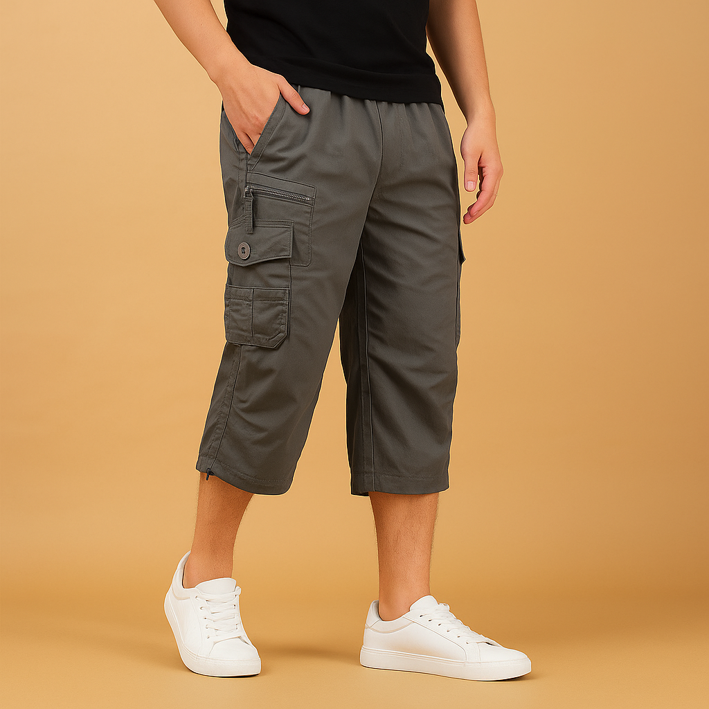 Men’s long cargo shorts with breathable cotton fabric and multiple pockets, ideal for summer, travel, and outdoor activities.